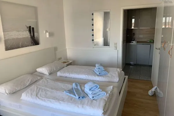 Schlafzimmer Appartement-Haus Regina Ferienwohnung Inseltraum