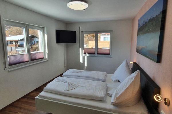  Ferienhaus Luca Ferienwohnungen in Hopfen am See - Schlafzimmer