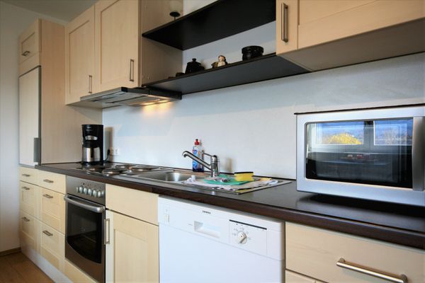  Ferienwohnung Seerose Ferienwohnungen in Hopfen am See - Küche / Küchenzeile