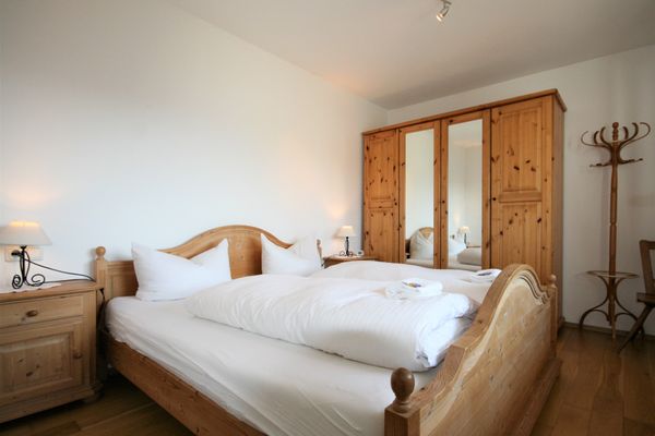  Ferienwohnung Seerose Ferienwohnungen in Hopfen am See - Schlafzimmer