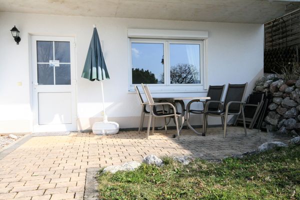  Ferienwohnung Seerose Ferienwohnungen in Hopfen am See - Gartenblick