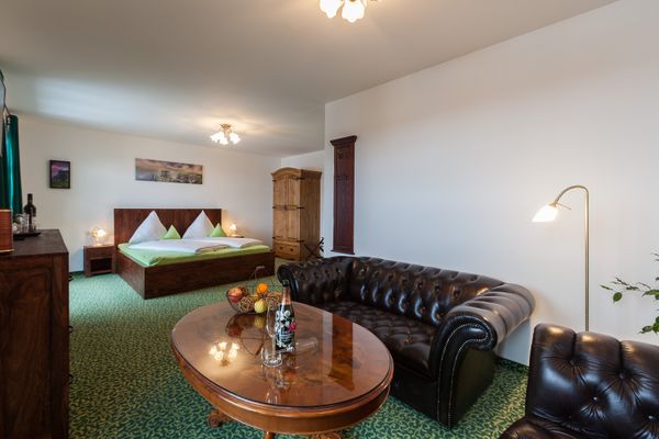 Vitusfort Doppelzimmer Cliff of Moher Ferienwohnungen in Hopfen am See - Wohnzimmer