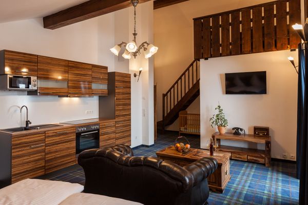 Vitusfort Appartement "Highlander Suite" Ferienwohnungen in Hopfen am See - Wohnzimmer