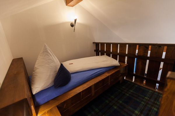 Vitusfort Appartement "Highlander Suite" Ferienwohnungen in Hopfen am See - Schlafzimmer
