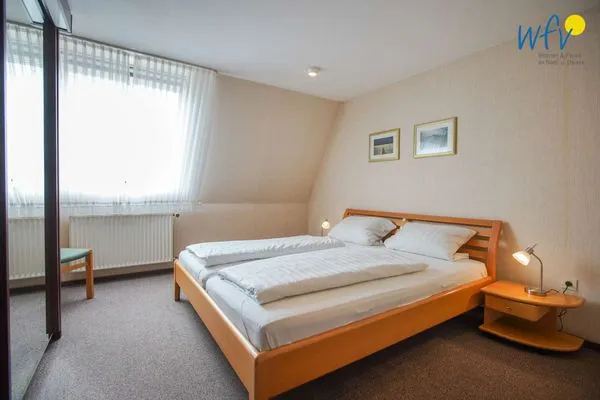 Schlafzimmer Haus Bonhuis Ferienwohnung Leuchtturmblick