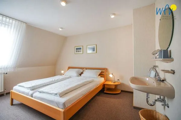 Schlafzimmer Haus Bonhuis Ferienwohnung Leuchtturmblick