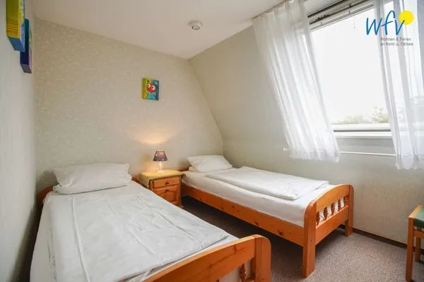 Schlafzimmer Haus Bonhuis Ferienwohnung Leuchtturmblick