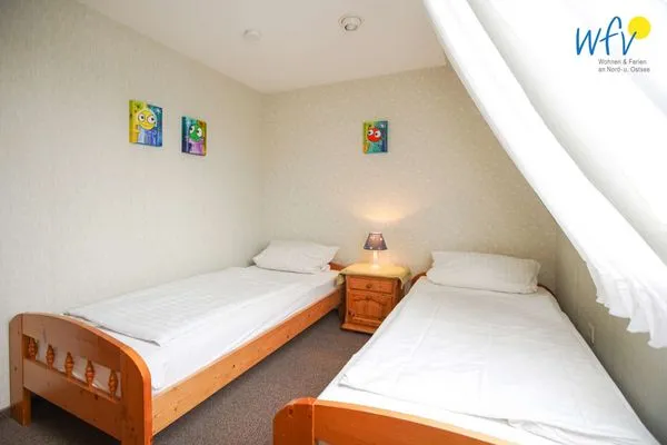 Schlafzimmer Haus Bonhuis Ferienwohnung Leuchtturmblick