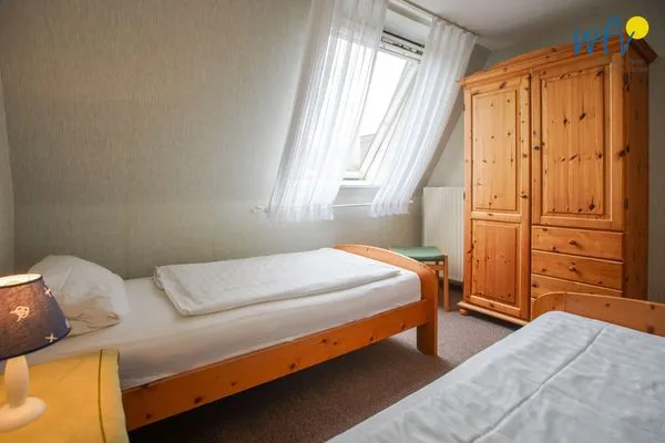 Schlafzimmer Haus Bonhuis Ferienwohnung Leuchtturmblick
