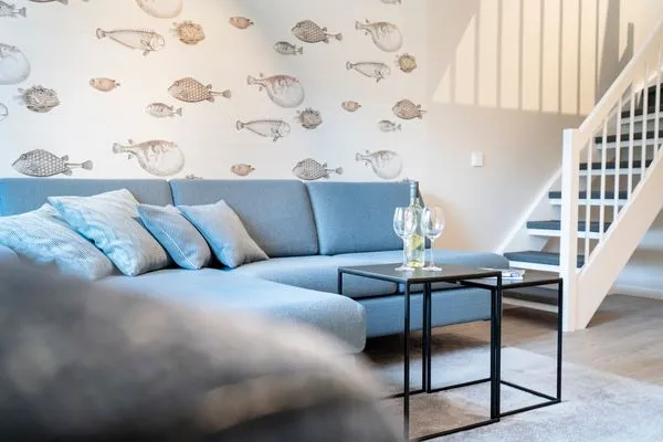 Wohnzimmer, Sofa und Sessel mit Couchtisch Gorch-Fock-Park Ferienwohnung "App. 31 Hygge"