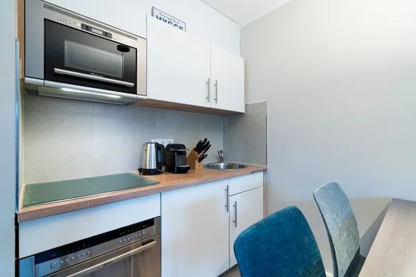 Küchenzeile mit gemütlicher Sitzecke Gorch-Fock-Park Ferienwohnung "App. 31 Hygge"