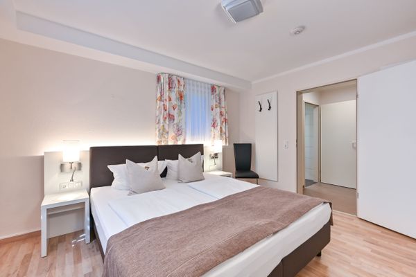 Ferienanlage Neuschwansteinblick Ferienwohnung 121 Ferienwohnungen in Füssen - Schlafzimmer