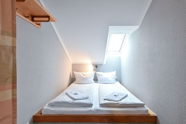 Ferienanlage Neuschwansteinblick Ferienwohnung 129 Ferienwohnungen in Füssen - Schlafzimmer