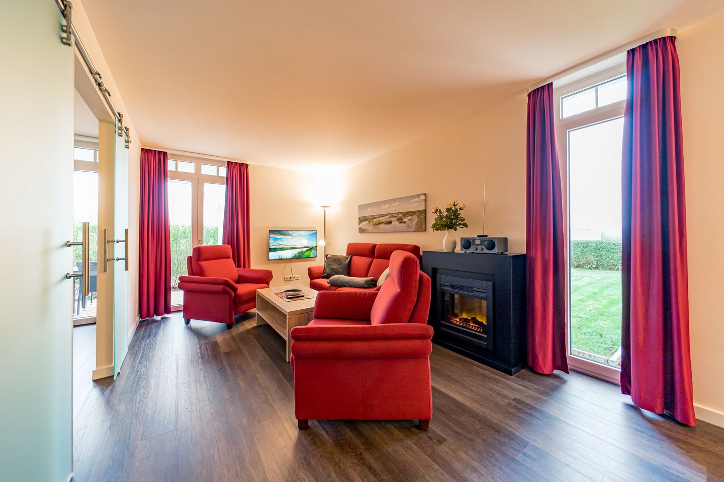 Resort Deichgraf Resort Deichgraf 27-05 Wremen - Wohnbereich mit Sitzgelegenheit