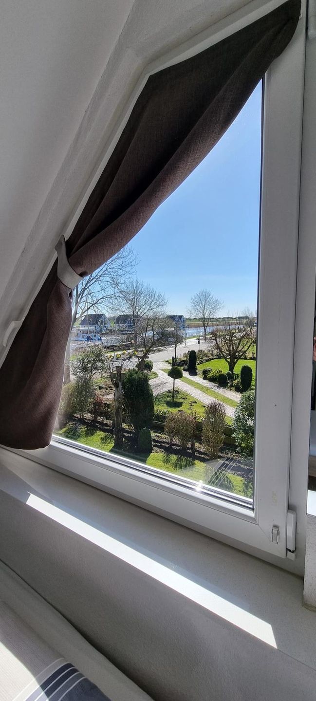  Ferienwohnung Am Yachthafen 100 Obergeschoss Harlesiel - 