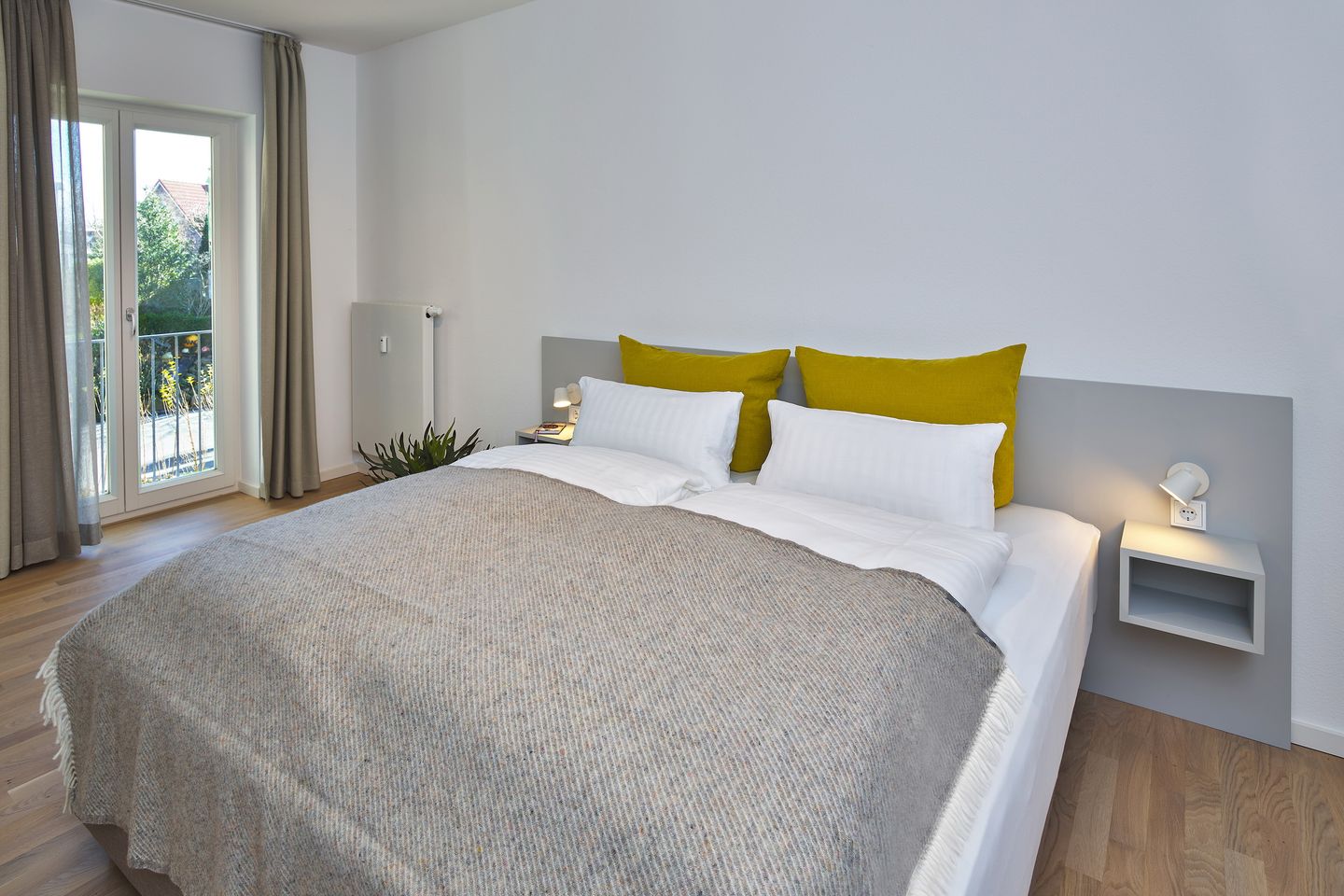 Lüttjeod Apartmentvilla Lüttjeod Apartmentvilla 02 Langeoog - Schlafzimmer mit Doppelbett