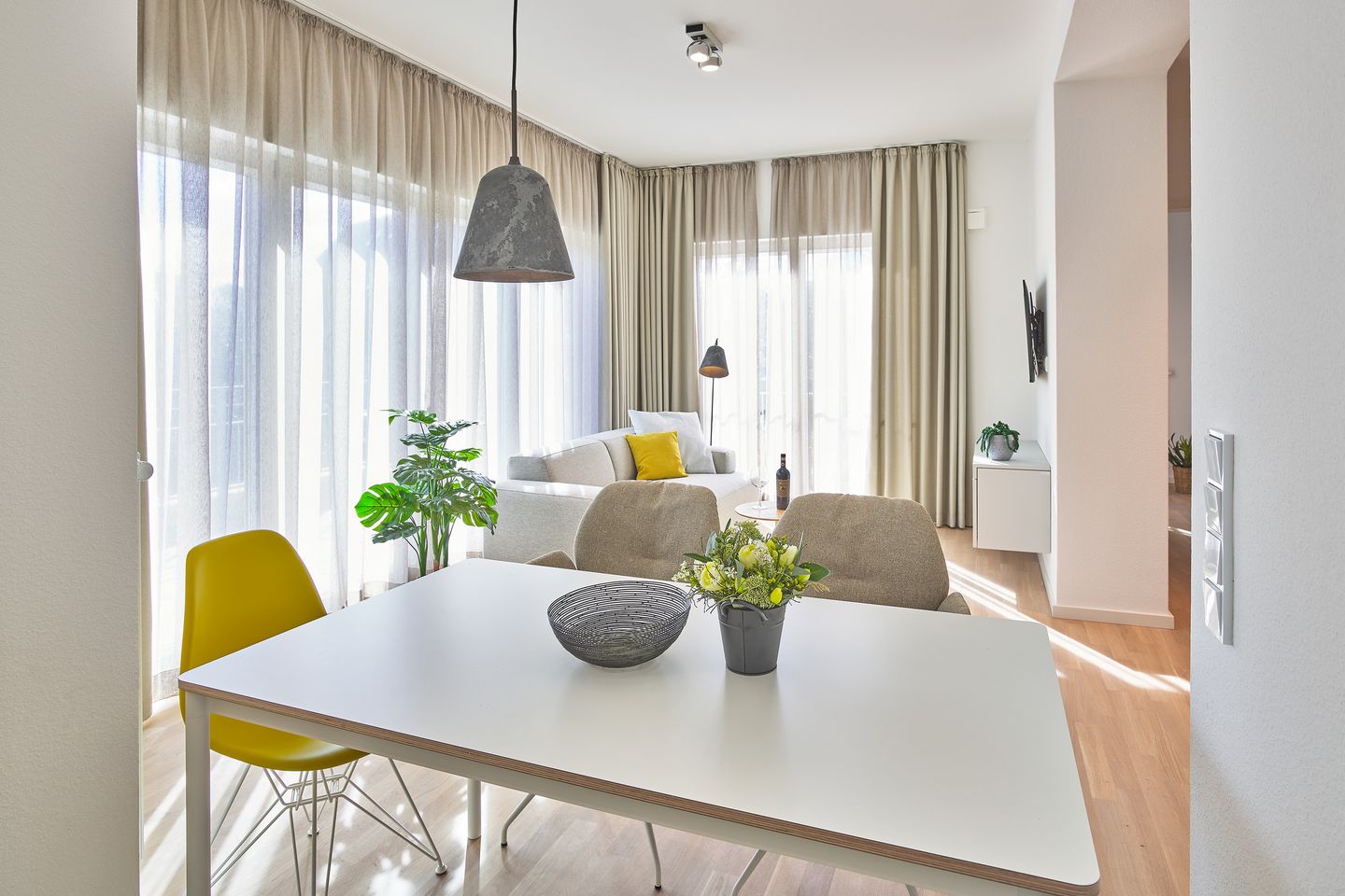 Lüttjeod Apartmentvilla Lüttjeod Apartmentvilla 02 Langeoog - Wohn-Essbereich mit Esstisch und Sitzgelegenheit