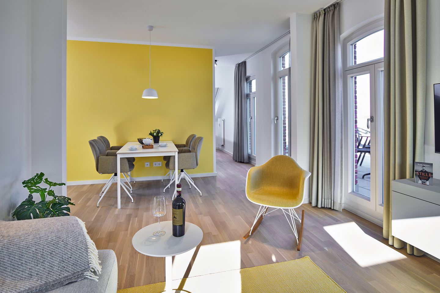 Lüttjeod Apartmentvilla Lüttjeod Apartmentvilla 15 Langeoog - Wohn-Essbereich mit Esstisch und Sitzgelegenheit