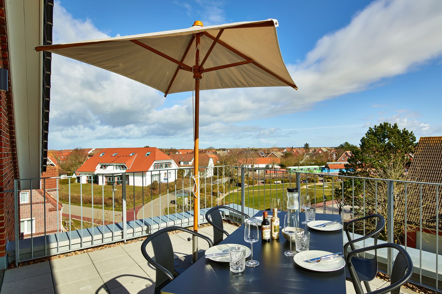 Lüttjeod Apartmentvilla Lüttjeod Apartmentvilla 15 Langeoog - Balkon mit Gartenmöbeln