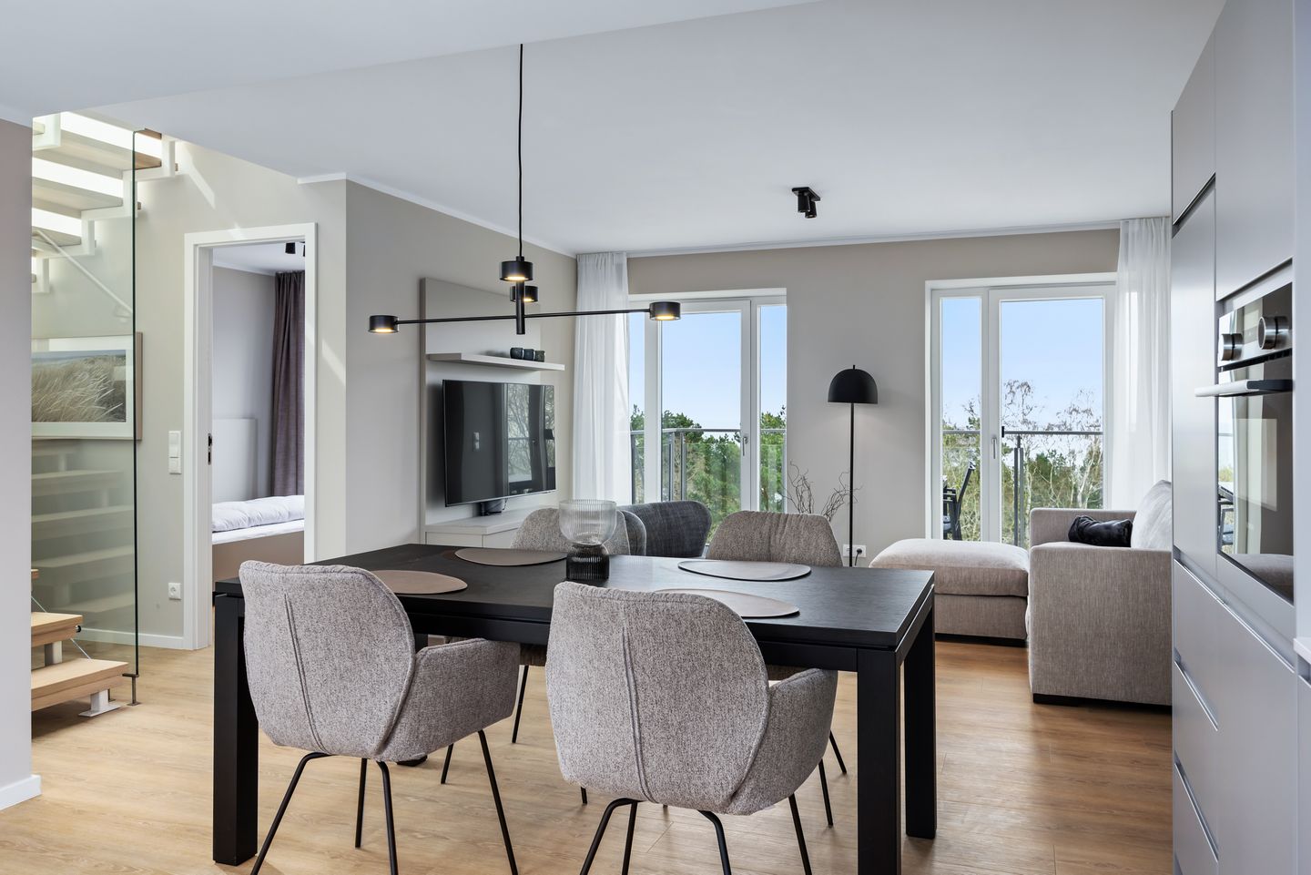 Strandresidenzen Binz-Prora Strandresidenzen Binz-Prora D5.5 Rügen - Wohn-Essbereich mit Couch