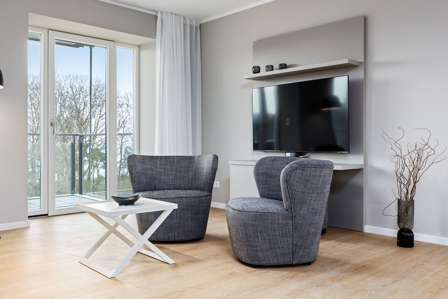 Strandresidenzen Binz-Prora Strandresidenzen Binz-Prora V4.1 Rügen - Wohn-Essbereich mit Couch