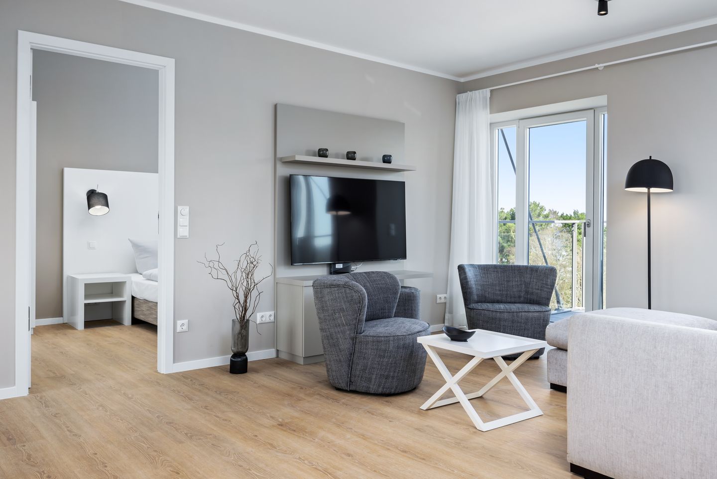 Strandresidenzen Binz-Prora Strandresidenzen Binz-Prora V5.1 Rügen - Wohn-Essbereich mit Couch