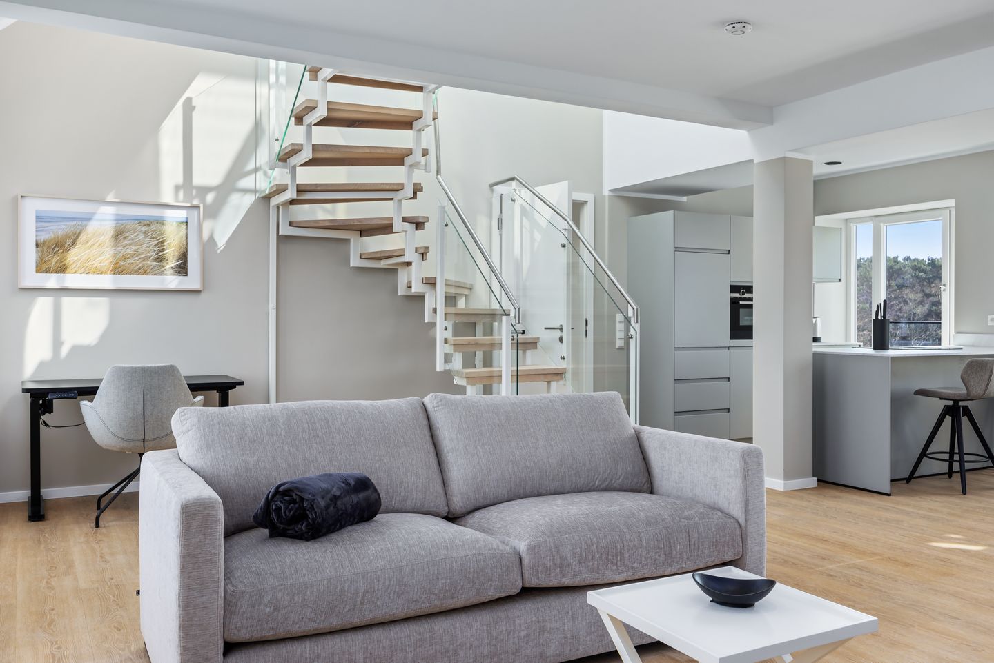 Strandresidenzen Binz-Prora Strandresidenzen Binz-Prora V5.1 Rügen - Wohn-Essbereich mit Couch