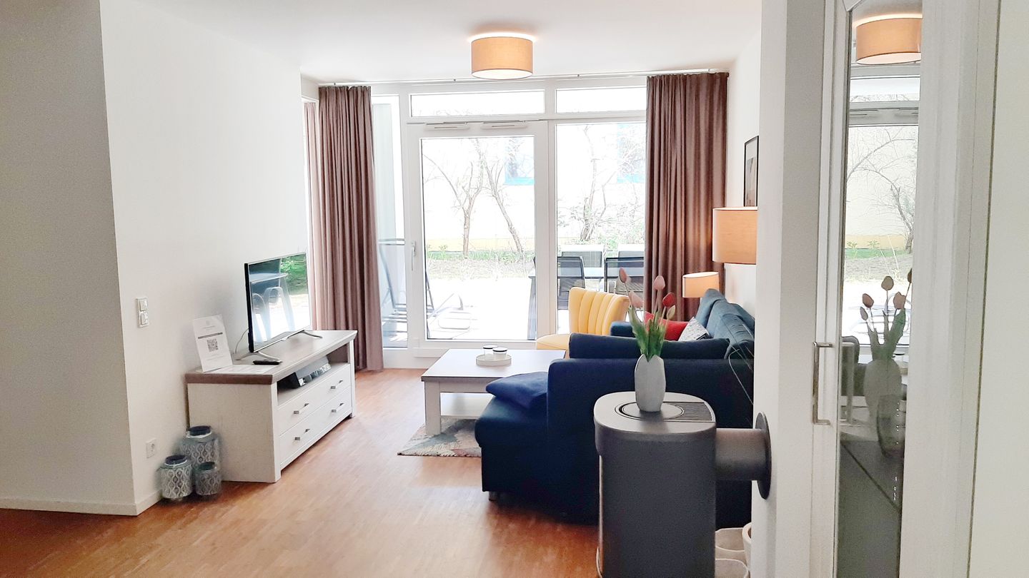 DünenResort Binz DünenResort Binz 413 Rügen - Wohn-Essbereich mit Couch