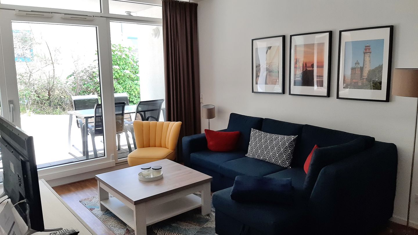 DünenResort Binz DünenResort Binz 413 Rügen - Wohn-Essbereich mit Couch