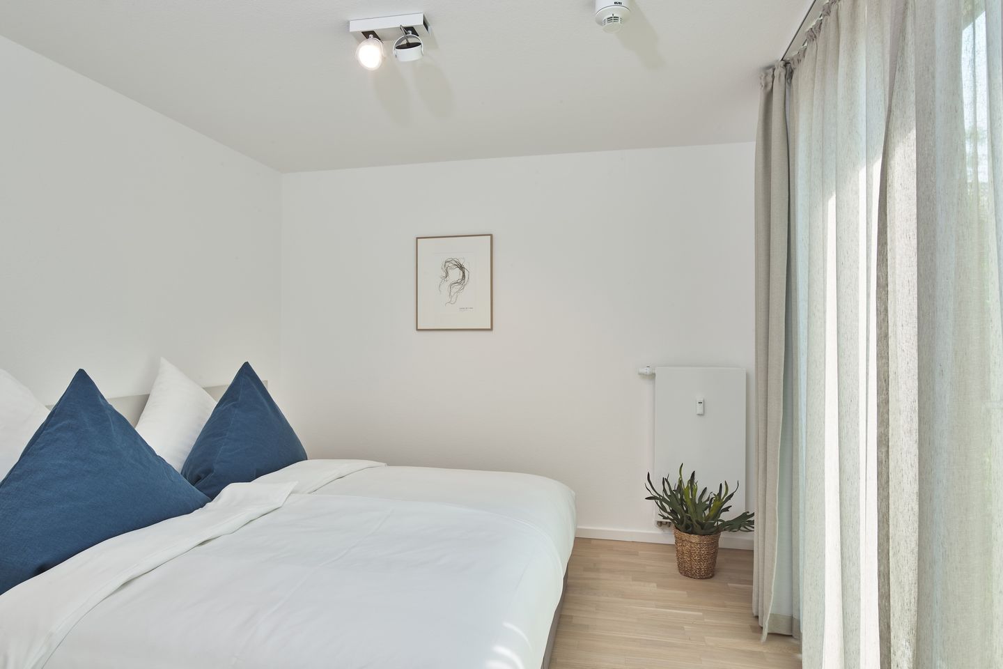 Lüttjeod Apartmentvilla Lüttjeod Apartmentvilla 06 Langeoog - Schlafzimmer mit Doppelbett