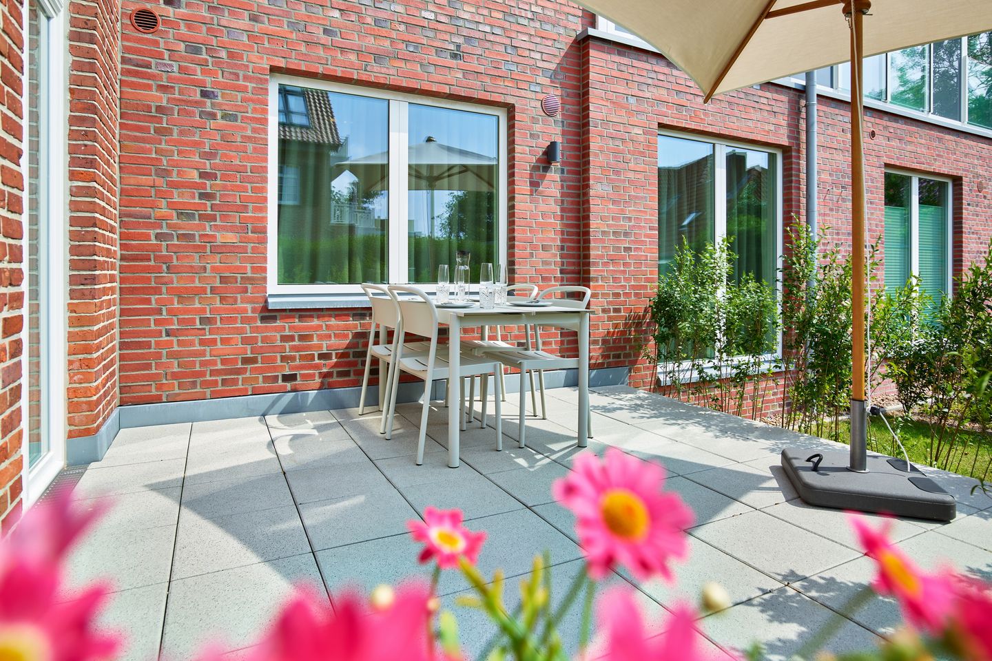 Lüttjeod Apartmentvilla Lüttjeod Apartmentvilla 06 Langeoog - Terrasse mit Gartenmöbeln