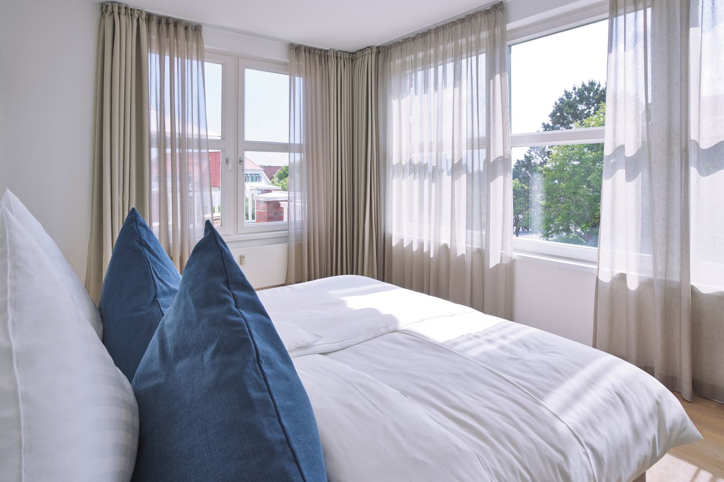 Lüttjeod Apartmentvilla Lüttjeod Apartmentvilla 08 Langeoog - Schlafzimmer mit Doppelbett