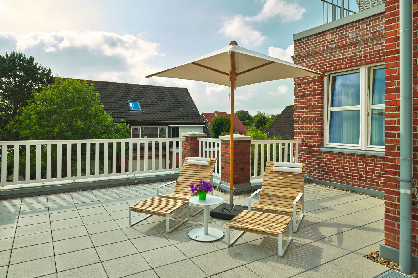 Lüttjeod Apartmentvilla Lüttjeod Apartmentvilla 08 Langeoog - Balkon mit Gartenmöbeln