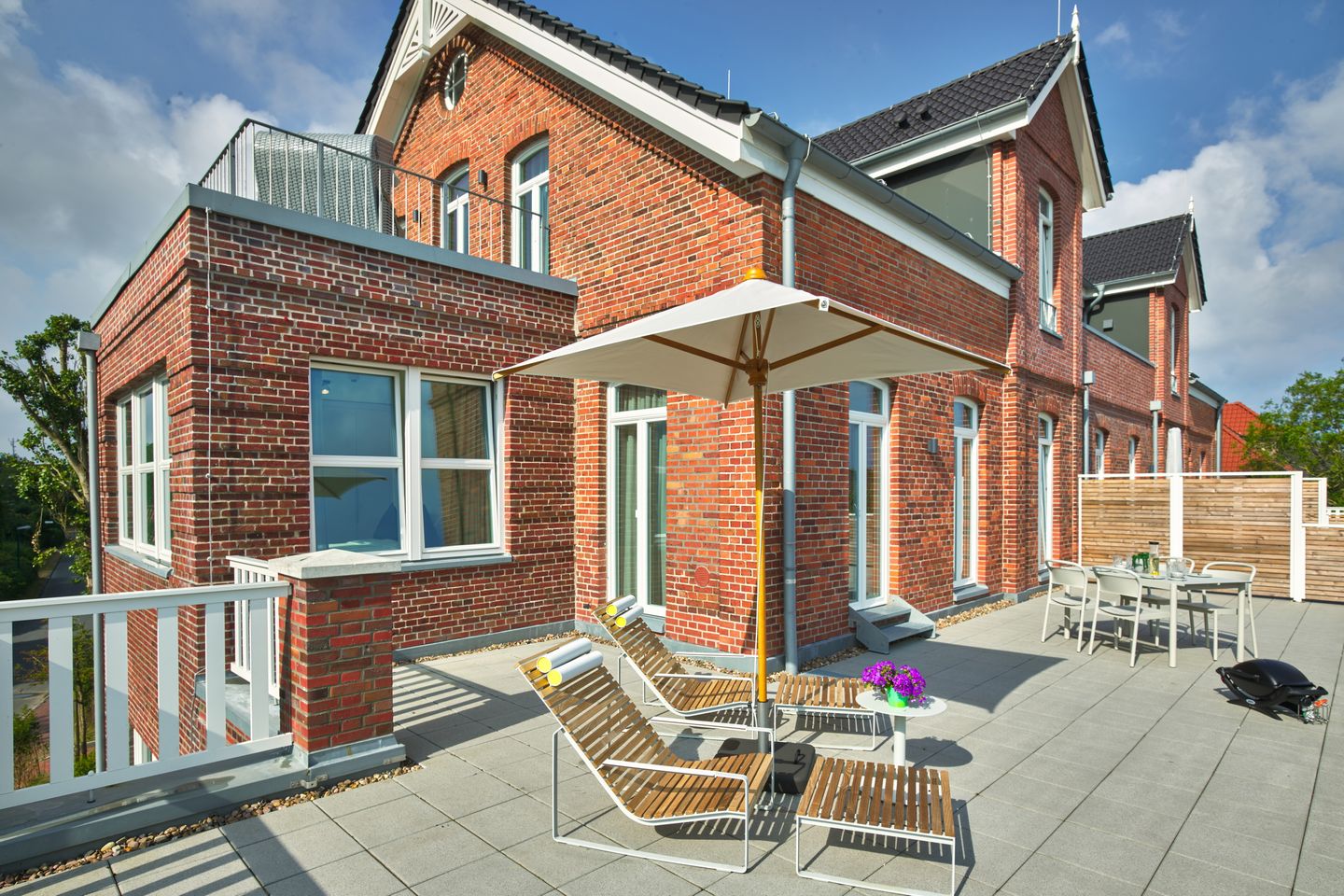 Lüttjeod Apartmentvilla Lüttjeod Apartmentvilla 08 Langeoog - Balkon mit Gartenmöbeln