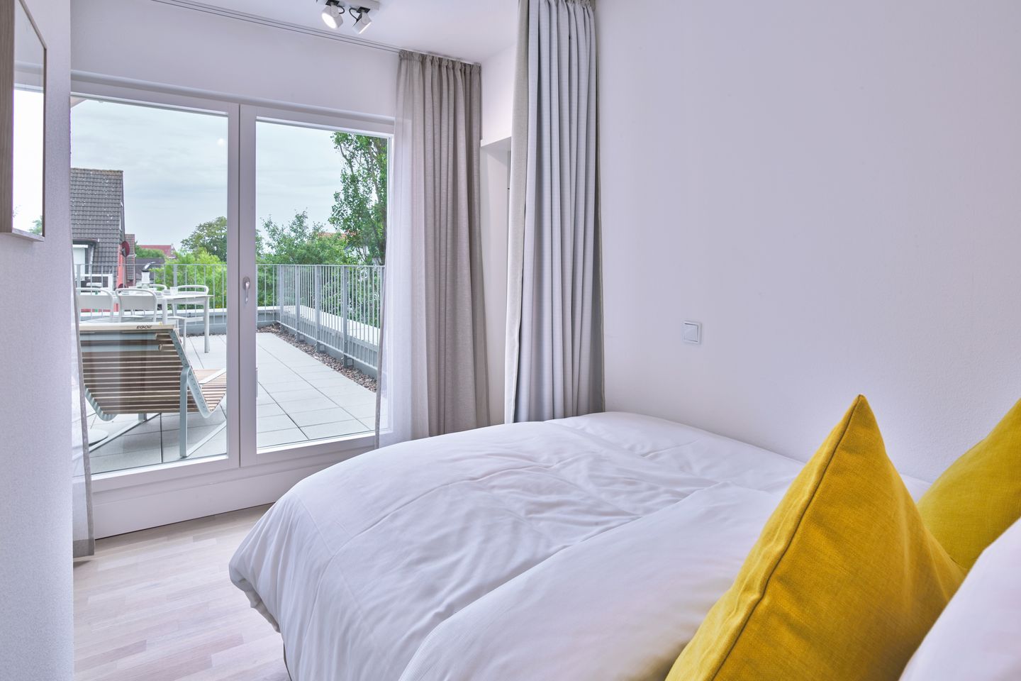 Lüttjeod Apartmentvilla Lüttjeod Apartmentvilla 09 Langeoog - Schlafzimmer mit Doppelbett