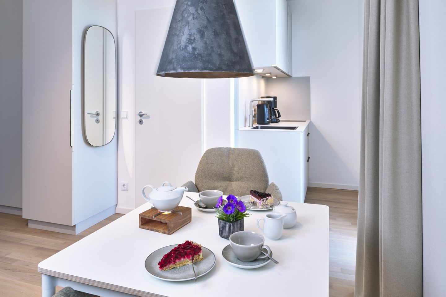 Lüttjeod Apartmentvilla Lüttjeod Apartmentvilla 14 Langeoog - Wohn-Essbereich mit Doppelbett