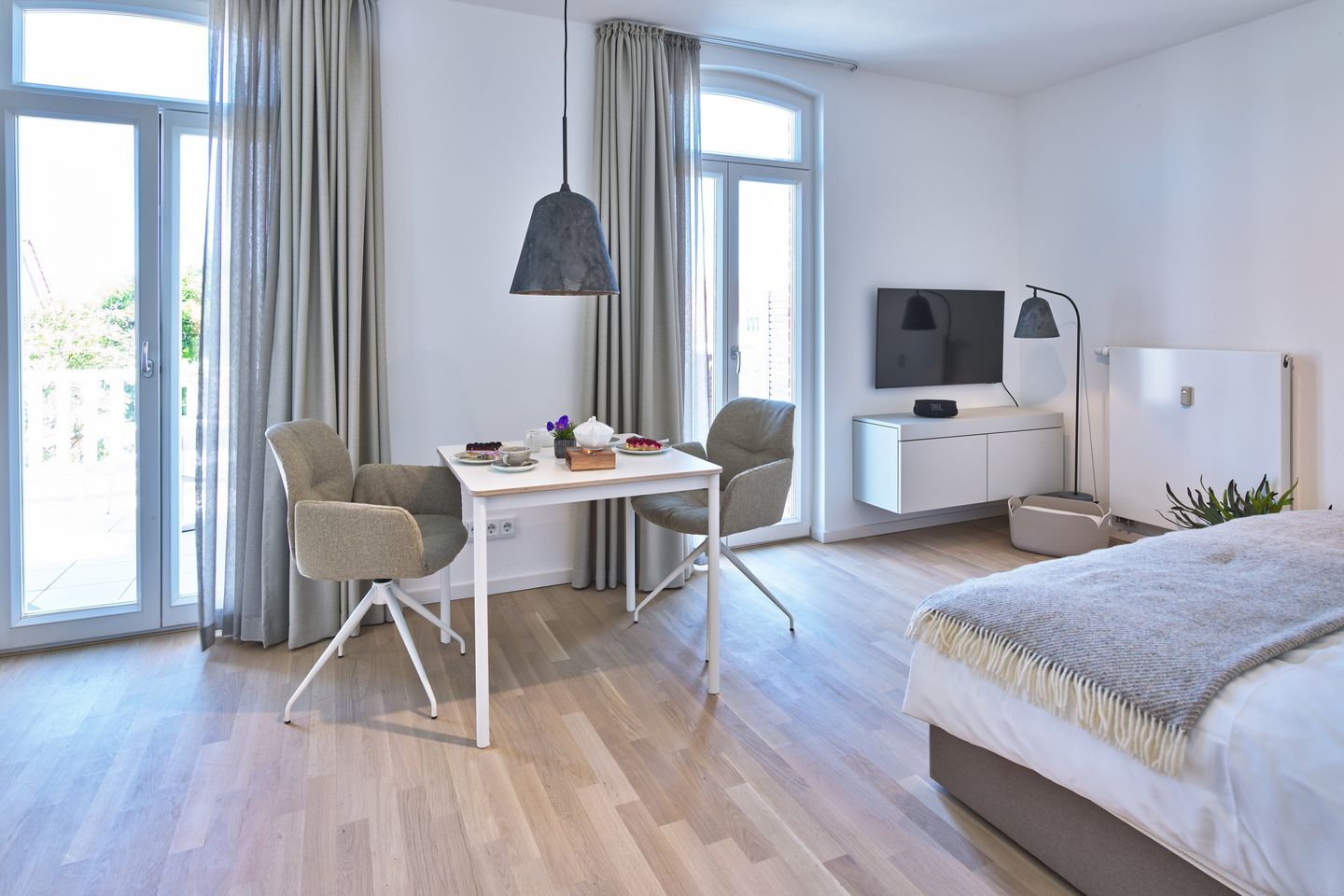 Lüttjeod Apartmentvilla Lüttjeod Apartmentvilla 14 Langeoog - Wohn-Essbereich mit Doppelbett