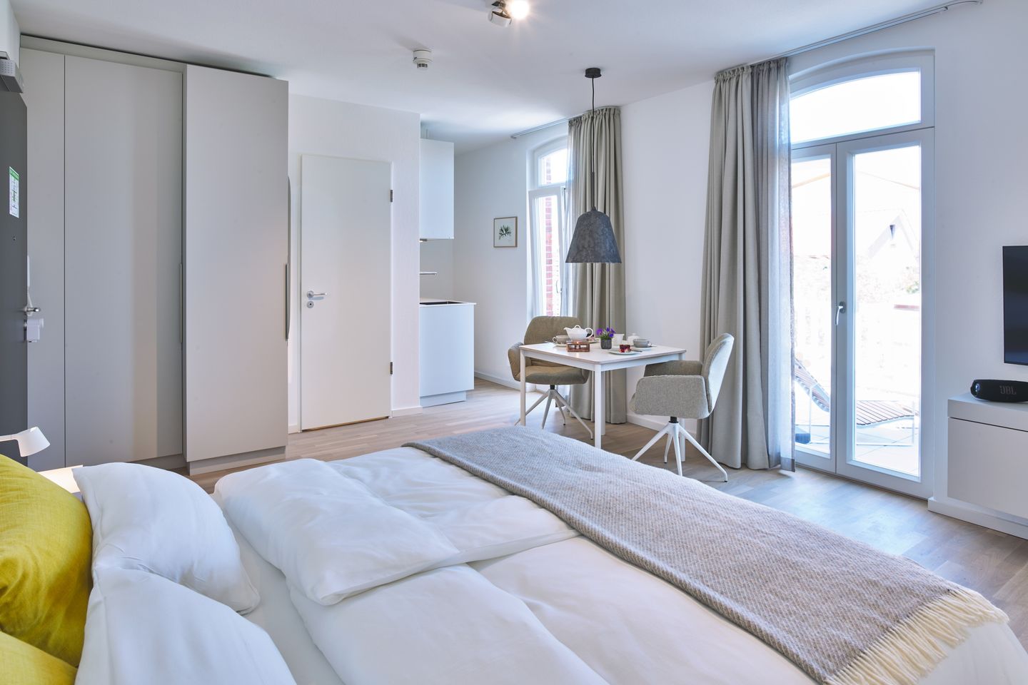 Lüttjeod Apartmentvilla Lüttjeod Apartmentvilla 14 Langeoog - Wohn-Essbereich mit Doppelbett