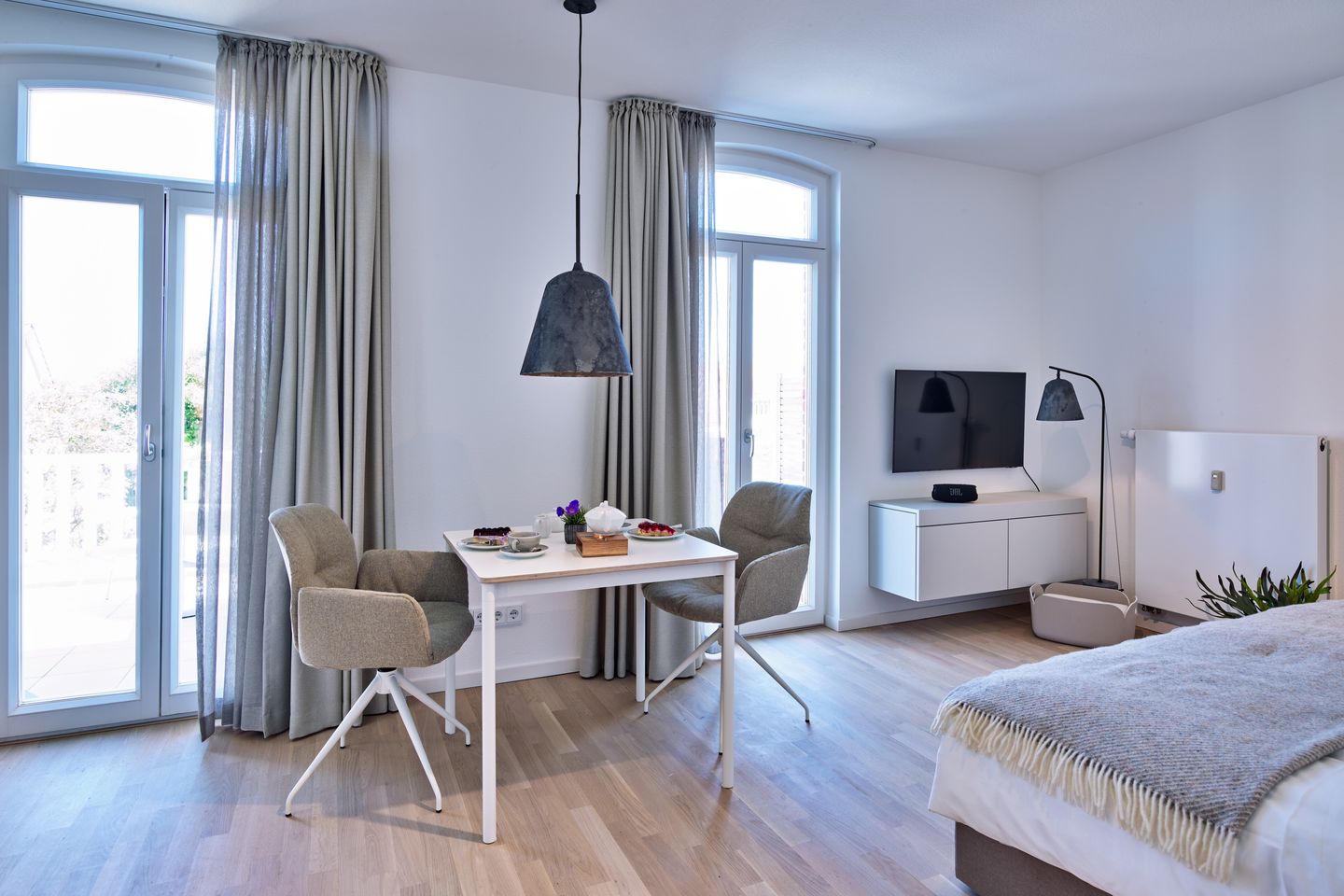 Lüttjeod Apartmentvilla Lüttjeod Apartmentvilla 14 Langeoog - Wohn-Essbereich mit Doppelbett