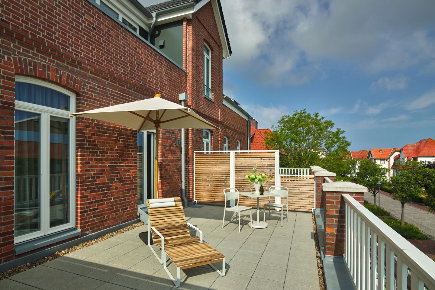 Lüttjeod Apartmentvilla Lüttjeod Apartmentvilla 14 Langeoog - Terrasse mit Gartenmöbeln