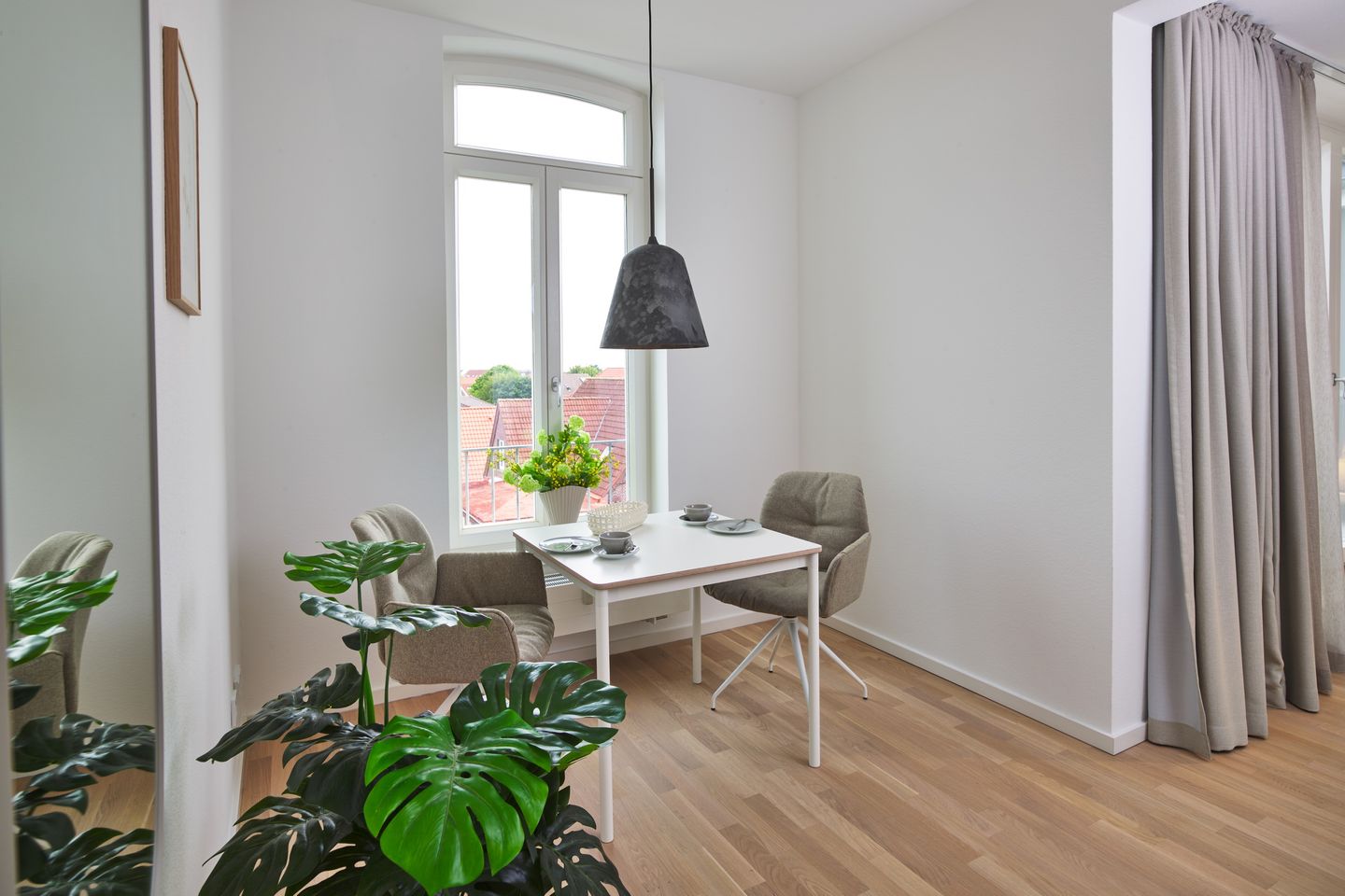 Lüttjeod Apartmentvilla Lüttjeod Apartmentvilla 18 Langeoog - Wohn-Essbereich mit Couch