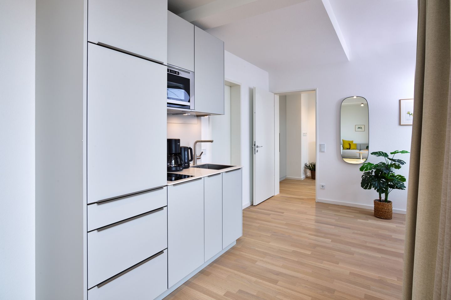 Lüttjeod Apartmentvilla Lüttjeod Apartmentvilla 18 Langeoog - Wohn-Essbereich mit Couch