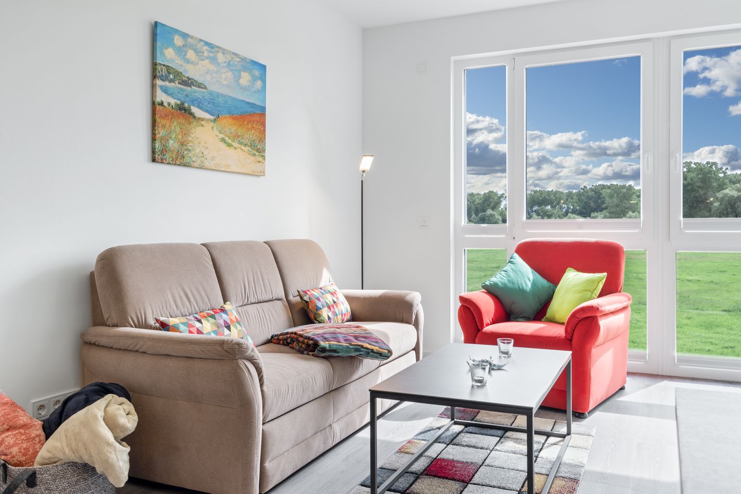 Weiße Villen Weiße Villen 2-16 Boltenhagen - Wohn-Essbereich mit Couch und Sitzgelegenheit