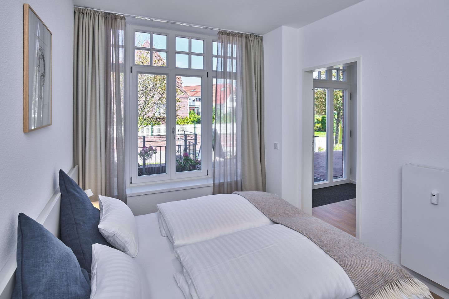 Lüttjeod Apartmentvilla Lüttjeod Apartmentvilla 01 Langeoog - Schlafzimmer mit Doppelbett