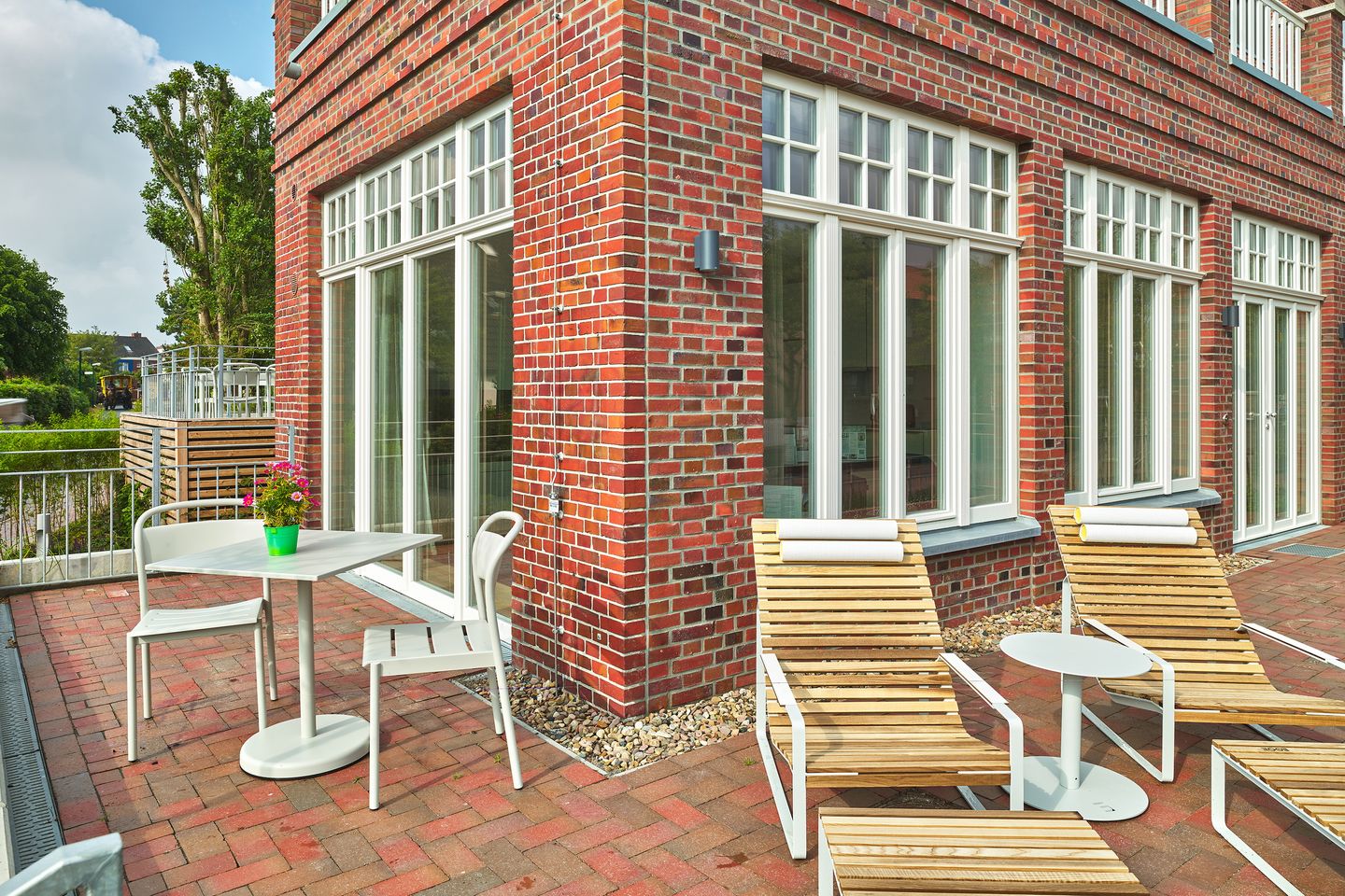 Lüttjeod Apartmentvilla Lüttjeod Apartmentvilla 01 Langeoog - Terrasse mit Gartenmöbeln