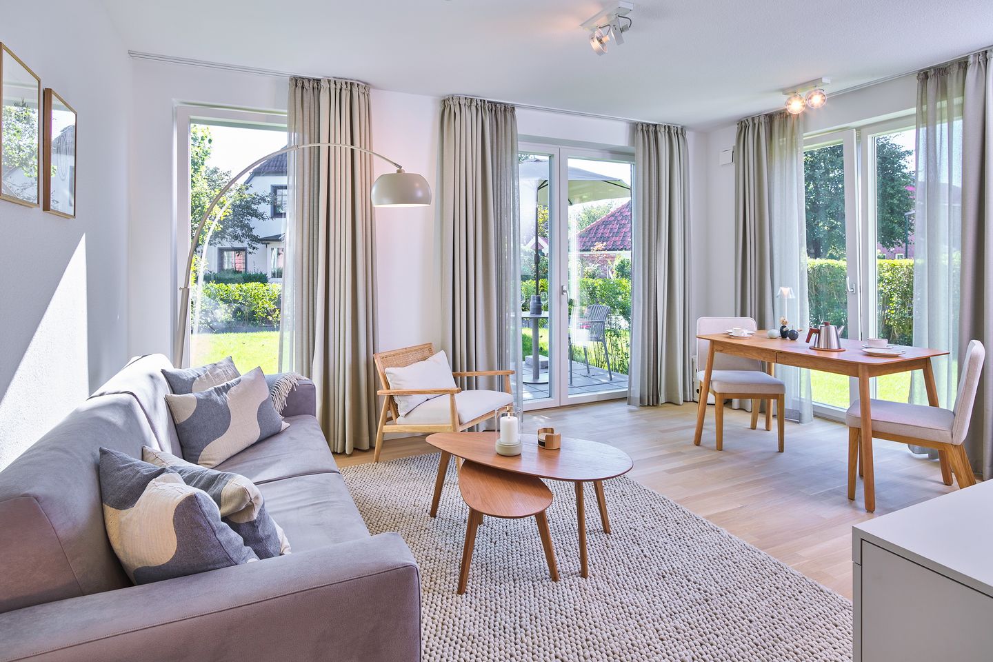 Lüttjeod Apartmentvilla Lüttjeod Apartmentvilla 04 Langeoog - Wohn-Essbereich mit Couch