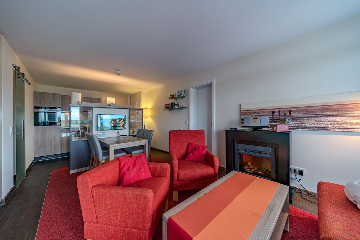 Resort Deichgraf Resort Deichgraf 27-08 Wremen - Wohn-Essbereich mit Couch