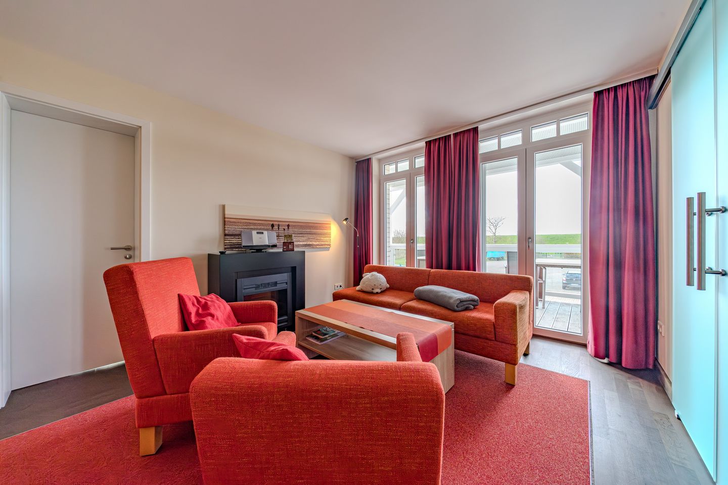 Resort Deichgraf Resort Deichgraf 27-08 Wremen - Wohn-Essbereich mit Couch