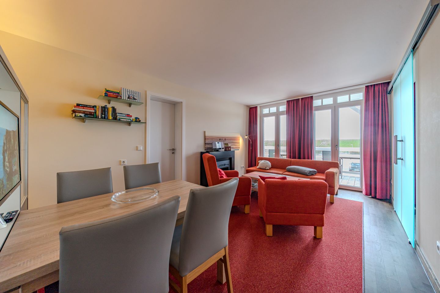 Resort Deichgraf Resort Deichgraf 27-08 Wremen - Wohn-Esszimmer mit Couch