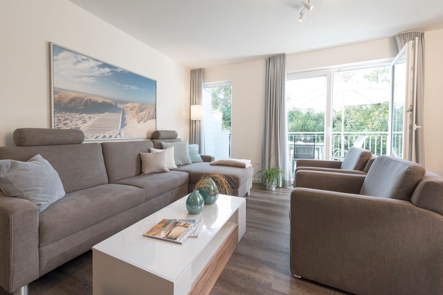 NordseeResort Friesland Ferienhäuser NordseeResort Friesland 38 Schillig - Wohn-Essbereich mit Couch